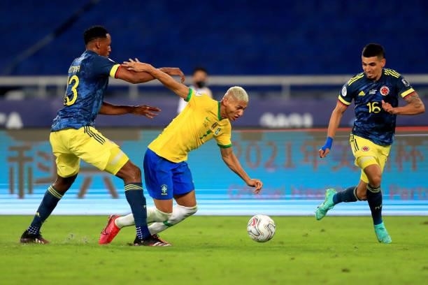 Richarlison of Brazil fights for the ball with Yerry Mina of Colombia during a Group B match between Brazil and Colombia as part of Copa America...