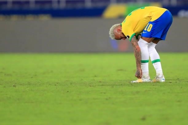 Neymar Jr. Of Brazil ties his boot laces during a Group B match between Brazil and Colombia as part of Copa America Brazil 2021 at Estadio Olímpico...