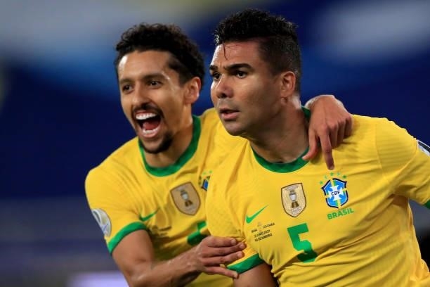 Casemiro of Brazil celebrates with teammate Marquinhos after scoring the second goal of his team during a Group B match between Brazil and Colombia...