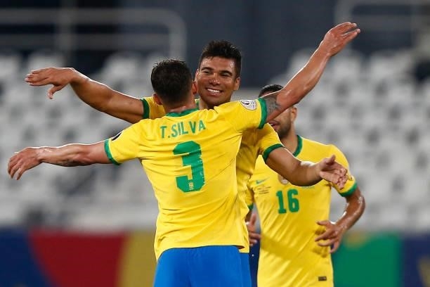 Casemiro of Brazil celebrates with teammate Thiago Silva after scoring the second goal of his team during a Group B match between Brazil and Colombia...