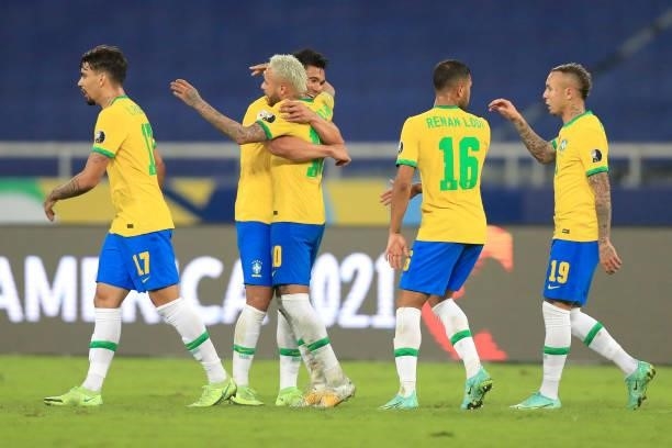 Casemiro of Brazil celebrates with teammate Neymar Jr. After scoring the the second goal of his team a Group B match between Brazil and Colombia as...