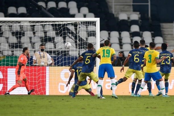 Casemiro of Brazil scores the the second goal of his team against David Ospina of Colombia during a Group B match between Brazil and Colombia as part...
