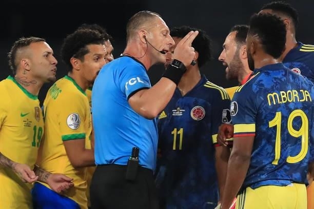 David Ospina of Colombia argues with referee Nestor Pitana during a Group B match between Brazil and Colombia as part of Copa America Brazil 2021 at...