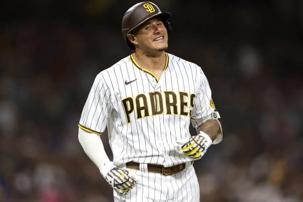 Manny Machado of the San Diego Padres reacrts after flying out during the sixth inning of a game against the Los Angeles Dodgers at PETCO Park on...