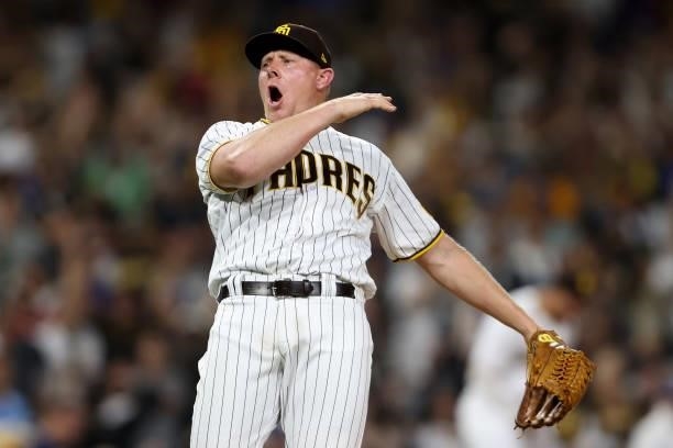 Mark Melancon of the San Diego Padres reacts after defeating the Los Angeles Dodgers 5-3 in a game at PETCO Park on June 23, 2021 in San Diego,...