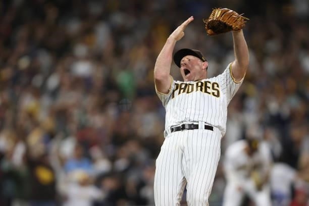 Mark Melancon of the San Diego Padres reacts after defeating the Los Angeles Dodgers 5-3 in a game at PETCO Park on June 23, 2021 in San Diego,...