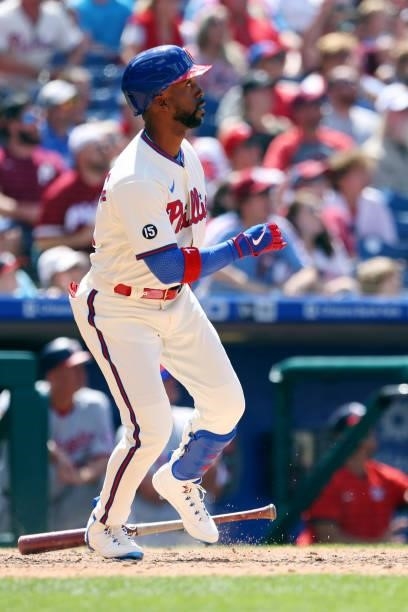 Andrew McCutchen of the Philadelphia Phillies hits a pinch-hit grand slam home run against the Washington Nationals during the fifth inning of a game...