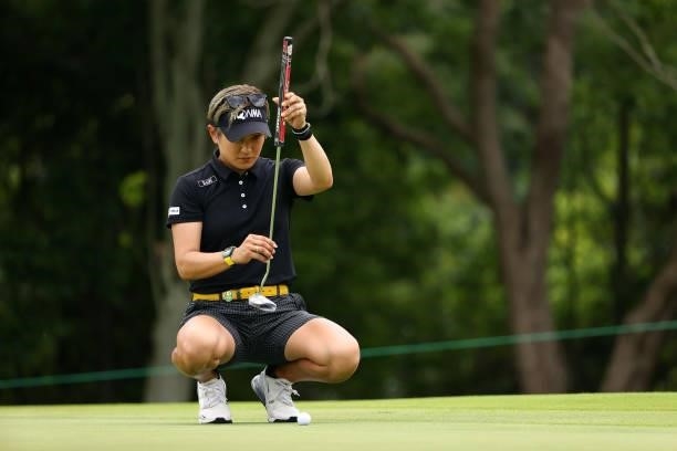 Misuzu Narita of Japan lines up a putt on the 6th green during the first round of the Earth Mondamin Cup at Camellia Hills Country Club on June 24,...