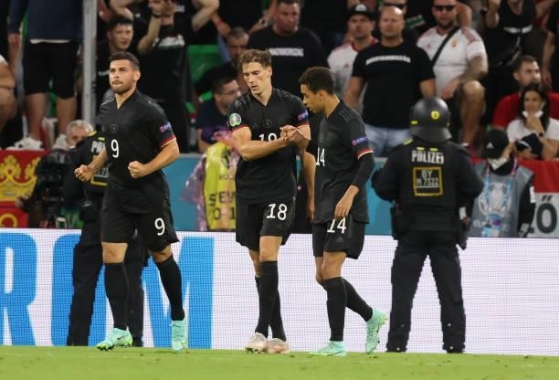 Leon Goretzka of germany with Jamal Musiala of germany during the UEFA Euro 2020 Championship Group F match between Germany and Hungary at Allianz...