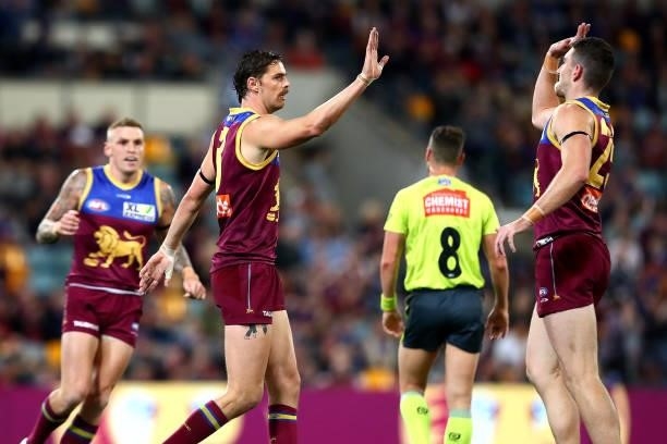Joe Daniher of the Lions celebrates a goal during the round 14 AFL match between the Brisbane Lions and the Geelong Cats at The Gabba on June 24,...