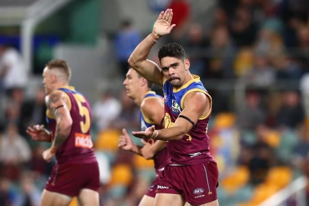 Charlie Cameron of the Lions celebrates a goal during the round 14 AFL match between the Brisbane Lions and the Geelong Cats at The Gabba on June 24,...