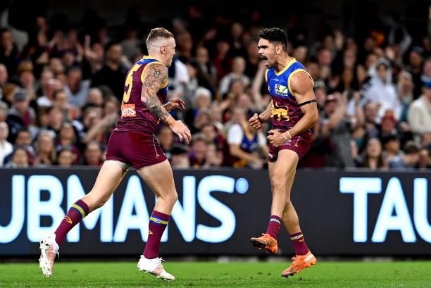 Charlie Cameron of the Lions celebrates after kicking a goal during the round 14 AFL match between the Brisbane Lions and the Geelong Cats at The...