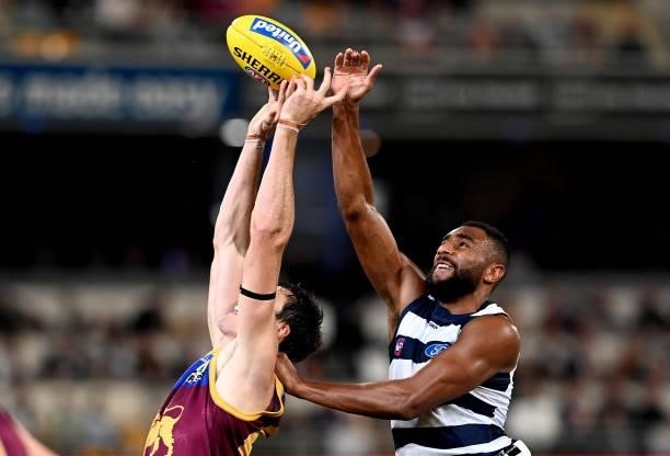 Oscar McInerney of the Lions and Esava Ratugolea of the Cats compete for the ball during the round 14 AFL match between the Brisbane Lions and the...