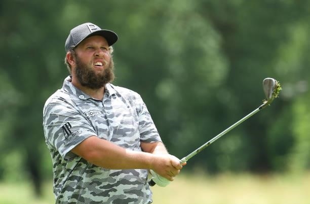 Andrew Johnston of England plays his second shot on the ninth hole during the first round of The BMW International Open at Golfclub Munchen...