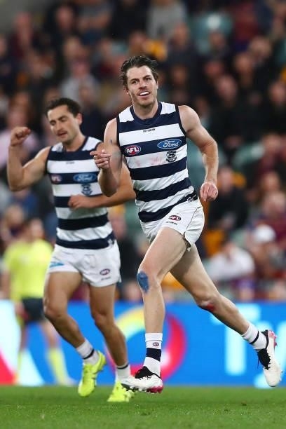 Isaac Smith of the Cats celebrates a goal during the round 14 AFL match between the Brisbane Lions and the Geelong Cats at The Gabba on June 24, 2021...