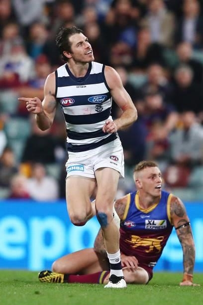 Isaac Smith of the Cats celebrates a goal during the round 14 AFL match between the Brisbane Lions and the Geelong Cats at The Gabba on June 24, 2021...