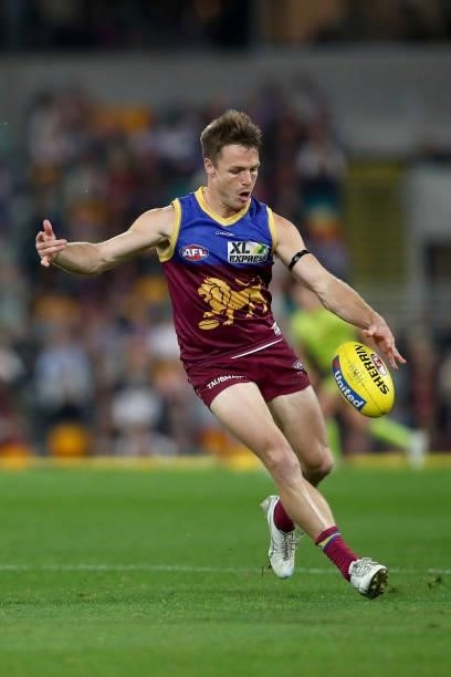 Lincoln McCarthy of the Lions kicks the ball during the round 14 AFL match between the Brisbane Lions and the Geelong Cats at The Gabba on June 24,...