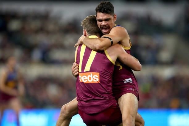 Charlie Cameron of the Lions celebrates a goal with Jarryd Lyons during the round 14 AFL match between the Brisbane Lions and the Geelong Cats at The...