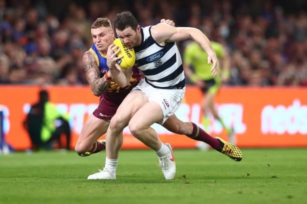 Patrick Dangerfield of the Cats runs the ball during the round 14 AFL match between the Brisbane Lions and the Geelong Cats at The Gabba on June 24,...