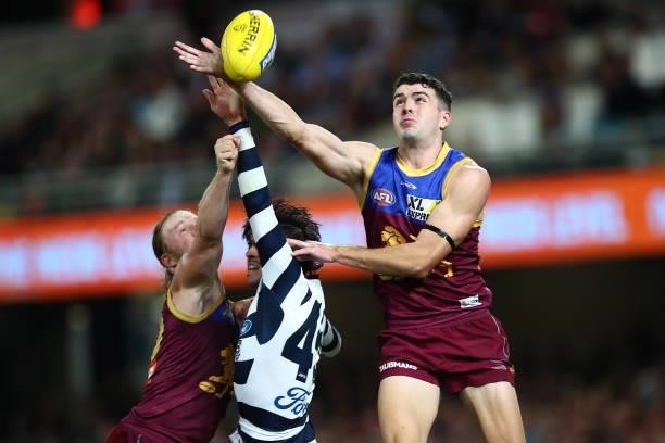 James Madden of the Lions gets a touch during the round 14 AFL match between the Brisbane Lions and the Geelong Cats at The Gabba on June 24, 2021 in...