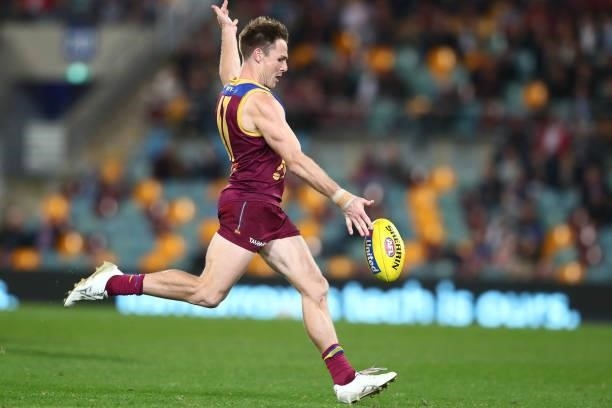 Lincoln McCarthy of the Lions kicks during the round 14 AFL match between the Brisbane Lions and the Geelong Cats at The Gabba on June 24, 2021 in...
