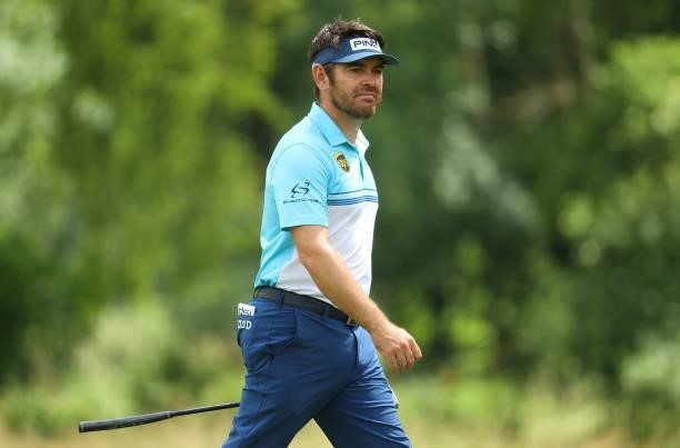 Louis Oosthuizen of South Africa walks down the fifth hole during the first round of The BMW International Open at Golfclub Munchen Eichenried on...