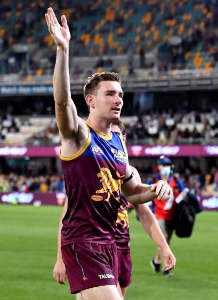 Harris Andrews of the Lions waves to the fans as he celebrates victory after the round 14 AFL match between the Brisbane Lions and the Geelong Cats...