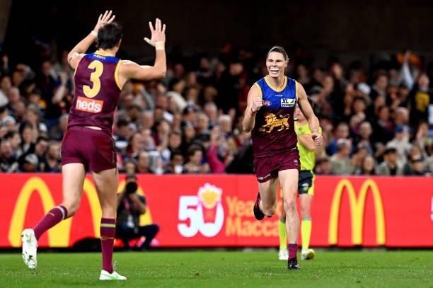 Eric Hipwood of the Lions celebrates with team mate Joe Daniher after kicking a goal during the round 14 AFL match between the Brisbane Lions and the...