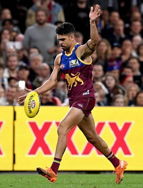 Charlie Cameron of the Lions kicks the ball during the round 14 AFL match between the Brisbane Lions and the Geelong Cats at The Gabba on June 24,...