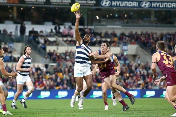 Esava Ratugolea of the Cats competes with Oscar McInerney of the Lions during the round 14 AFL match between the Brisbane Lions and the Geelong Cats...