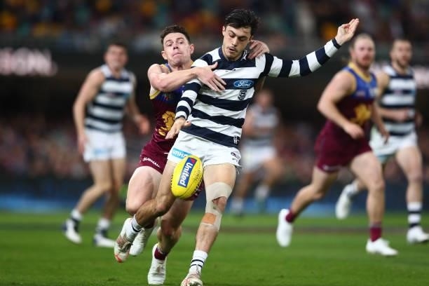 Brad Close of the Cats kicks during the round 14 AFL match between the Brisbane Lions and the Geelong Cats at The Gabba on June 24, 2021 in Brisbane,...