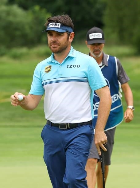 Louis Oosthuizen of South Africa acknowledges the crowd on the fifth green during the first round of The BMW International Open at Golfclub Munchen...