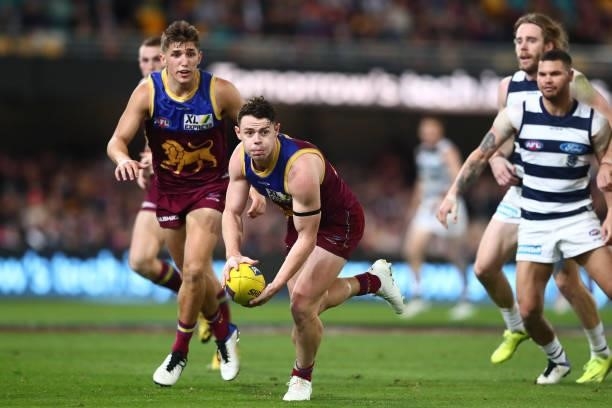 Lachie Neale of the Lions runs the ball during the round 14 AFL match between the Brisbane Lions and the Geelong Cats at The Gabba on June 24, 2021...