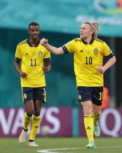 Emil Forsberg of Sweden celebrates scoring their second goal with teammate Alexander Isak during the UEFA Euro 2020 Championship Group E match...