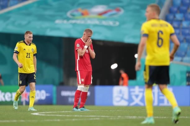Kamil Glik of Poland looks dejected after the Sweden third goal scored by Viktor Claesson during the UEFA Euro 2020 Championship Group E match...