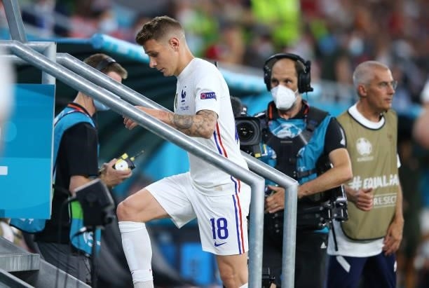 Lucas Digne of France leaves the field injured during the UEFA Euro 2020 Championship Group F match between Portugal and France at Puskas Arena on...
