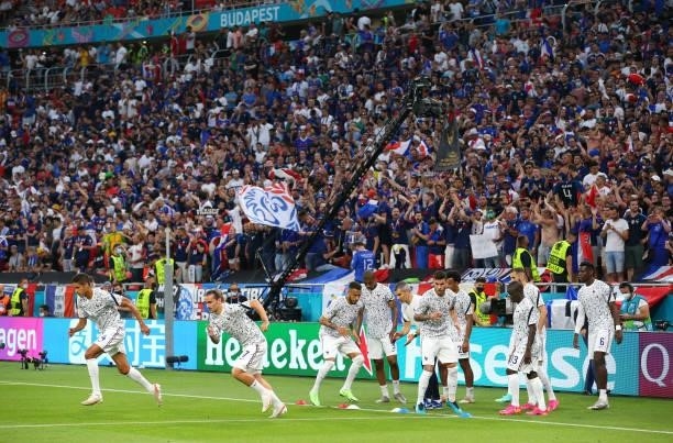 The players of France warm up prior to the UEFA Euro 2020 Championship Group F match between Portugal and France at Puskas Arena on June 23, 2021 in...