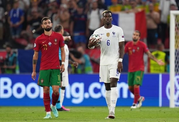 Paul Pogba of France and Bruno Fernandes of Portugal look on after the UEFA Euro 2020 Championship Group F match between Portugal and France at...