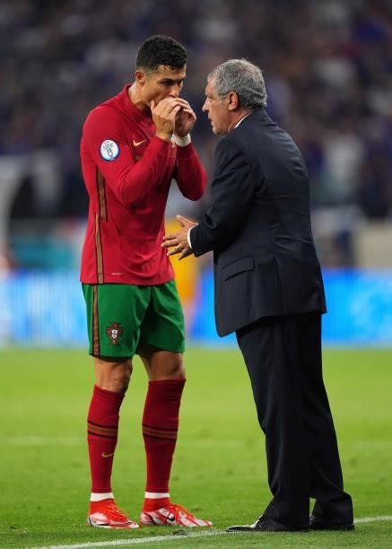 Cristiano Ronaldo of Portugal talks with Fernando Santos, Head Coach of Portugal during the UEFA Euro 2020 Championship Group F match between...