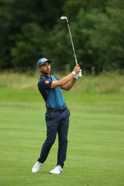 Sebastian Garcia Rodriguez of Spain plays his second shot on the 13th hole during the first round of The BMW International Open at Golfclub Munchen...
