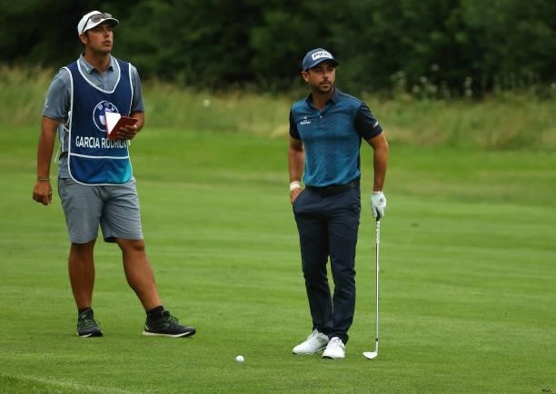 Sebastian Garcia Rodriguez of Spain prepares to play his second shot on the 13th hole during the first round of The BMW International Open at...