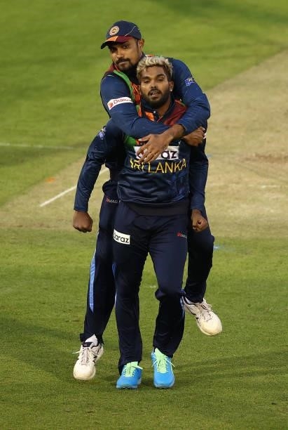 Wanindu Hasaranga of Sri Lanka celebrates takling the wicket of Jason Roy of England during the T20 International Series second T20I match between...
