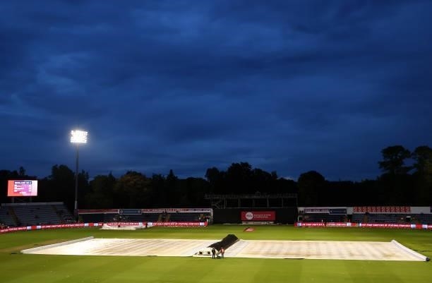 The covers are on as rain delays play during the T20 International Series second T20I match between England and Sri Lanka at Sophia Gardens on June...