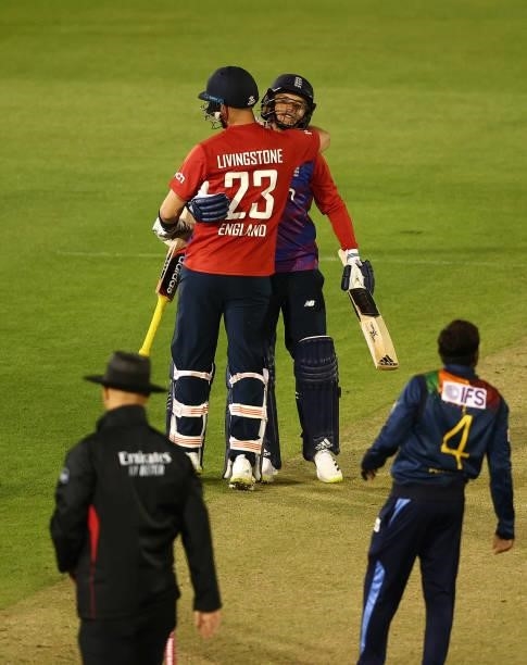 Sam Curran and Liam Livingstone of England celebrate winning the match during the T20 International Series second T20I match between England and Sri...