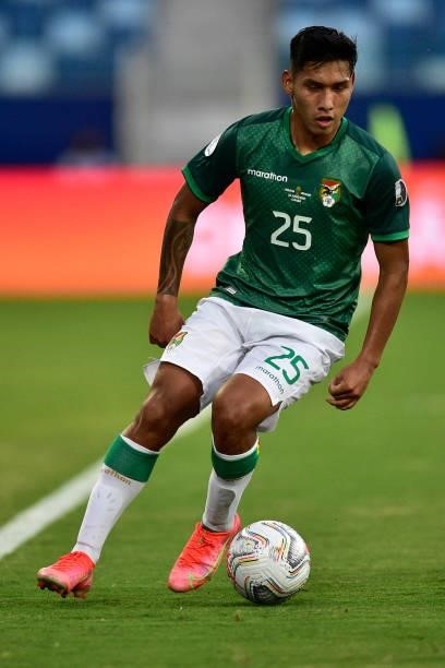 Jeyson Chura of Bolivia controls the ball during a Group A match between Bolivia and Uruguay as part of Copa America Brazil 2021 at Arena Pantanal on...