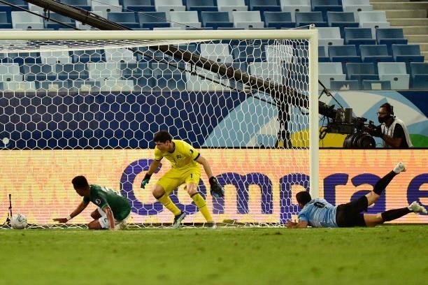 Carlos Lampe of Bolivia scores an own goal, the first goal of Uruguay, during a Group A match between Bolivia and Uruguay as part of Copa America...