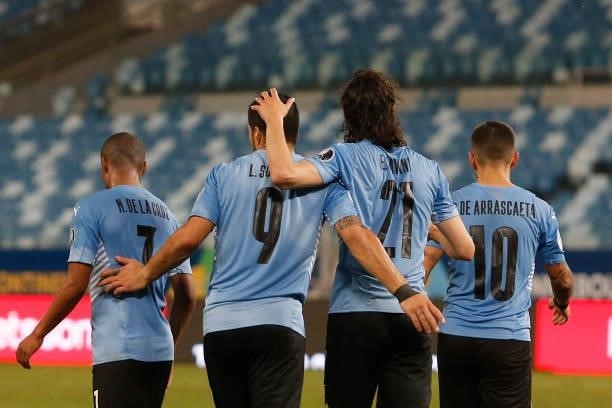 Nicolas De La Cruz, Luis Suarez, Edinson Cavani and Giorgian De Arrascaeta of Uruguay celebrate the first goal of their team scored by an own goal...
