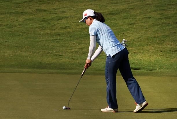 Ayako Uehara of Japan putts on the 16th hole during the first round of the KPMG Women's PGA Championship at Atlanta Athletic Club on June 24, 2021 in...