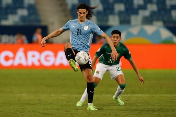 Edinson Cavani of Uruguay controls the ball against Ramiro Vaca of Bolivia during a Group A match between Bolivia and Uruguay as part of Copa America...