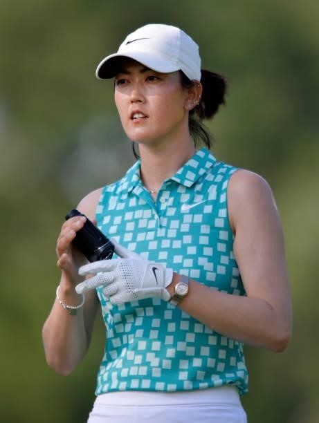 Michelle Wie West plays her shot from the ninth tee during the first round of the KPMG Women's PGA Championship at Atlanta Athletic Club on June 24,...